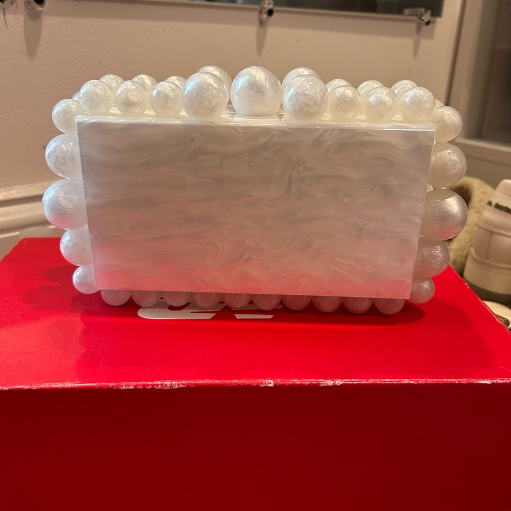 Elegant White Clutch with Pearl Accents